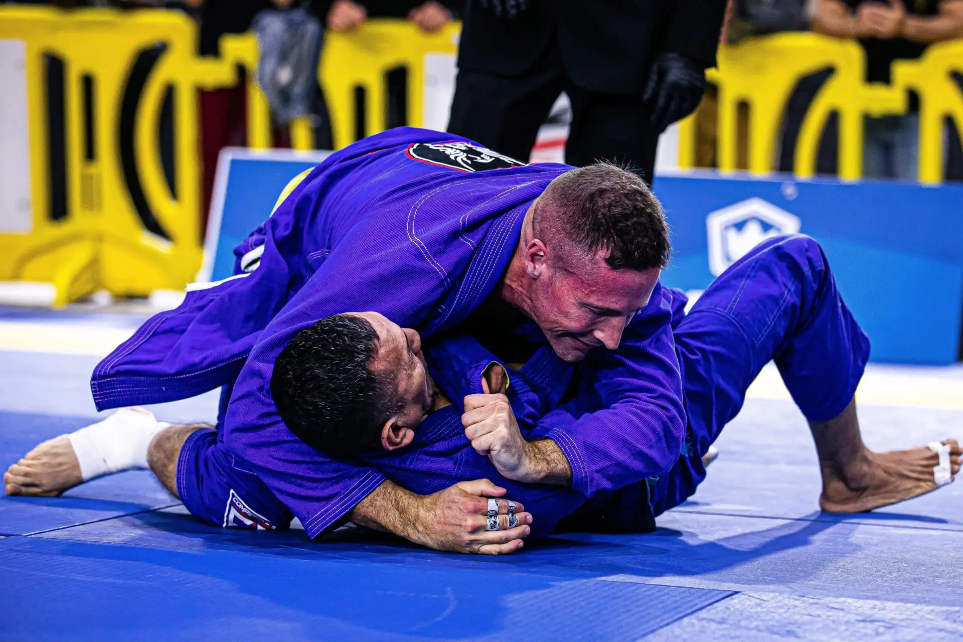 Beginners training on the mats during a Brazilian Jiu-Jitsu class at Competitive Edge Combat Sports in Florence, SC