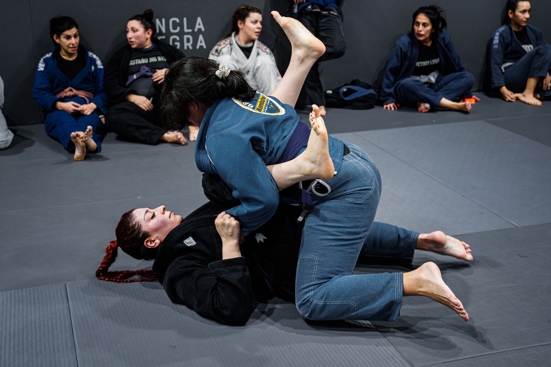 Women's jiu jitsu training using leverage in Florence, SC