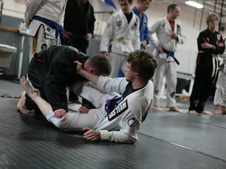 Students rolling during Brazilian Jiu Jitsu sparring in Florence, SC